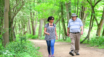 Active Lincolnshire people walking through woodlands