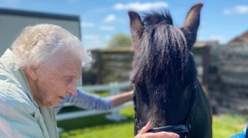 elderly lady with horse