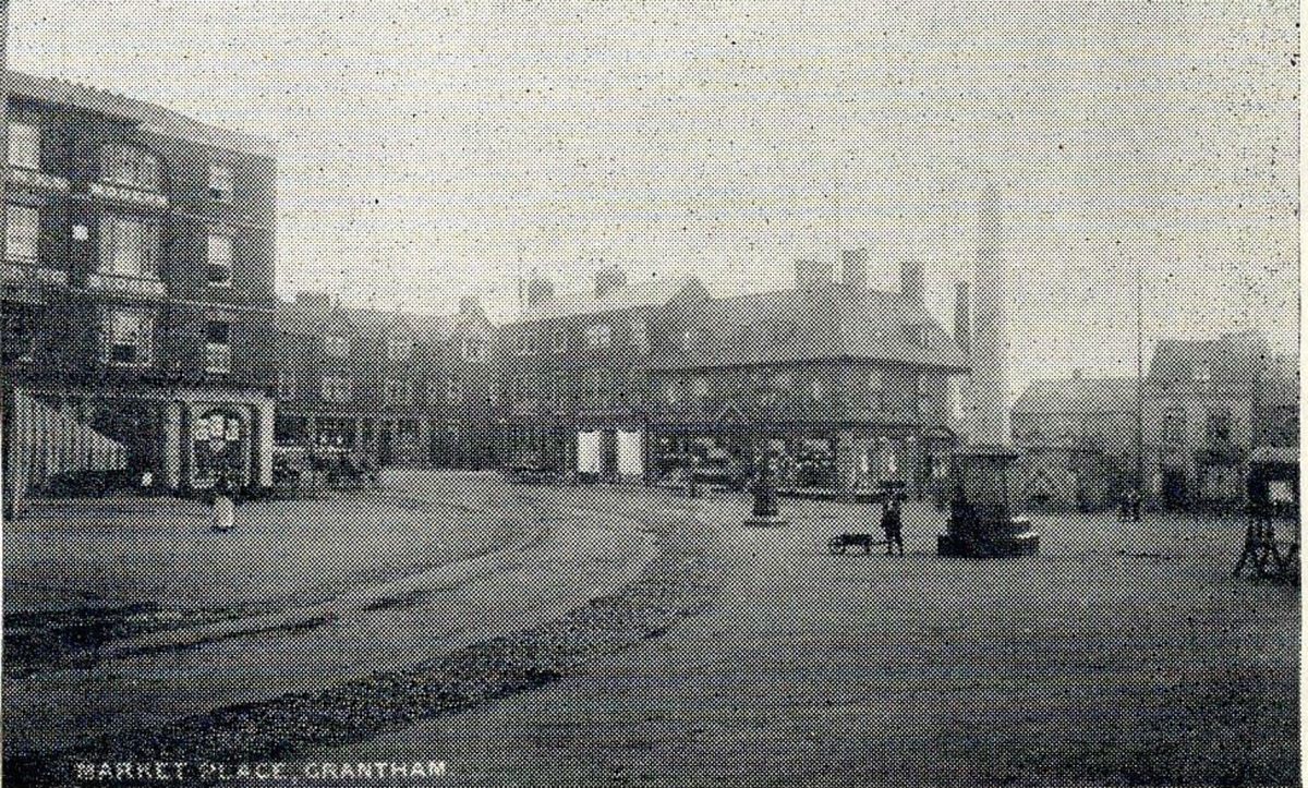 A quiet Market Place at the turn of the last century