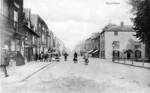 Policeman controlling traffic on High Street